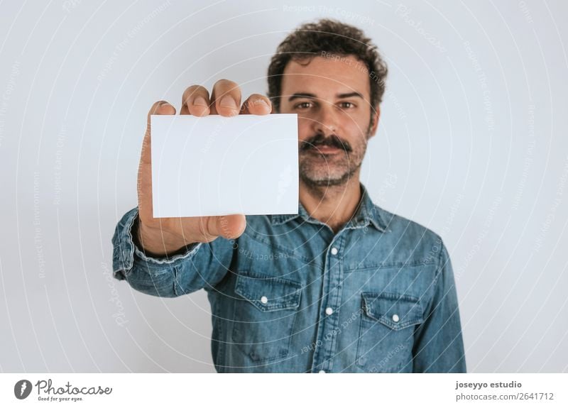 Portrait of a man showing a blank card. Lifestyle Face Human being Adults Shirt Stand Cool (slang) Hip & trendy Self-confident attractive background Blank