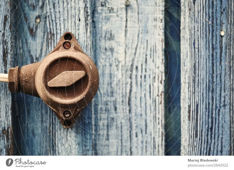 Retro toned picture of an old switch on wooden wall. Design House (Residential Structure) Wood Old Blue Brown Decadence Energy Idea Uniqueness Past Time