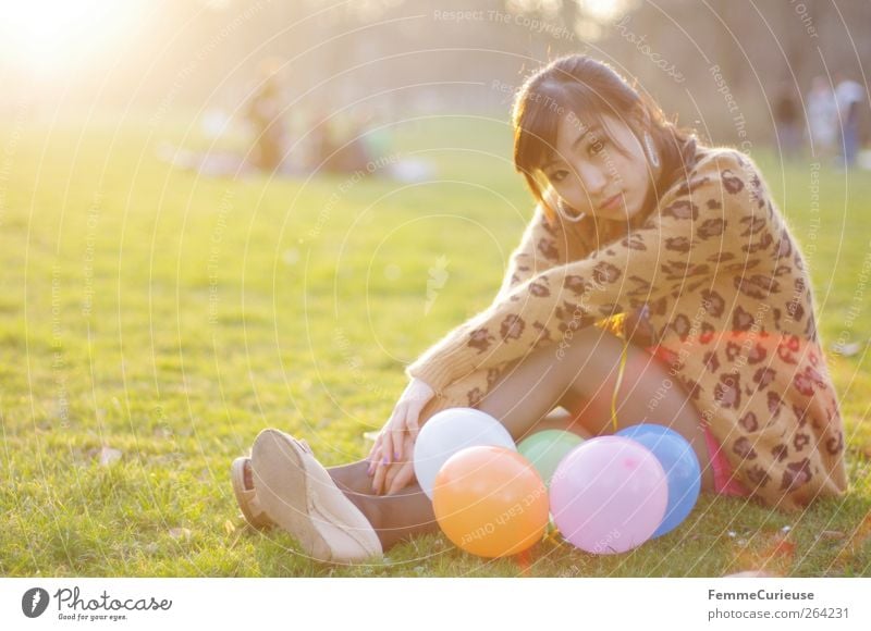 Spring Spring Spring XII Young woman Youth (Young adults) Woman Adults 1 Human being 18 - 30 years Relaxation Park Meadow Balloon Sit Chinese Girlish Sunbeam