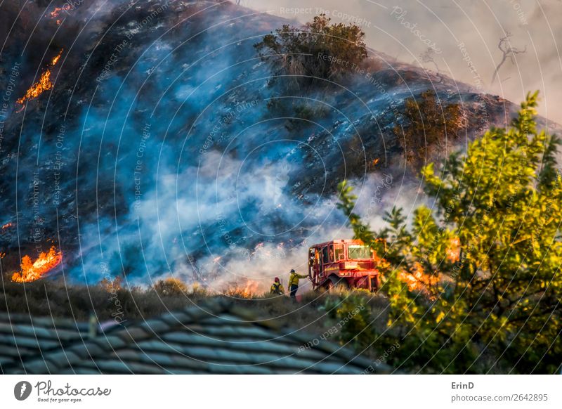 Two Firefighters Lean on Bulldozer with Burning Hillside Beautiful Environment Landscape Cool (slang) Uniqueness Brave Fear Colour Destruction fire brush
