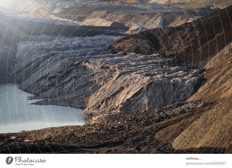 overburden heaps with lake in open pit mining Coal Soft coal mining renaturation Slagheap Energy industry Renewable energy Energy crisis Environment Landscape