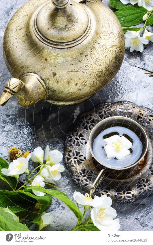 Tea with jasmine tea drink healthy herbal flower cup beverage green turkish eastern vintage arabic retro arabian ornament muslim jug islamic ritual moroccan