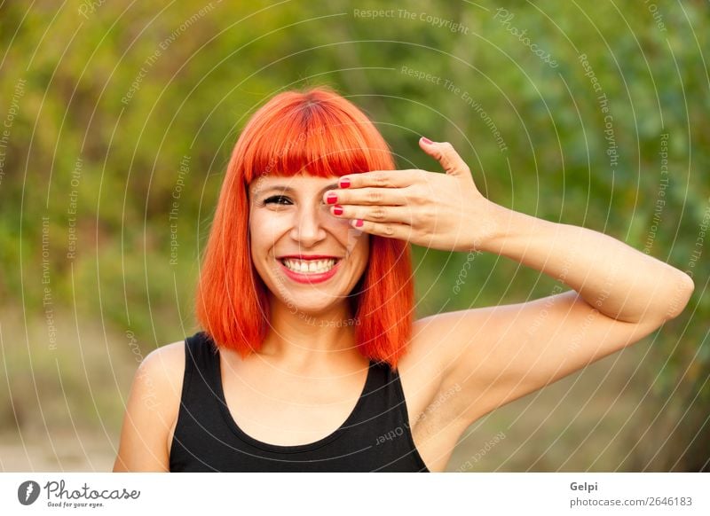 Red haired woman covering her eyes in a park Lifestyle Style Joy Happy Beautiful Hair and hairstyles Face Wellness Calm Playing Summer Human being Woman Adults