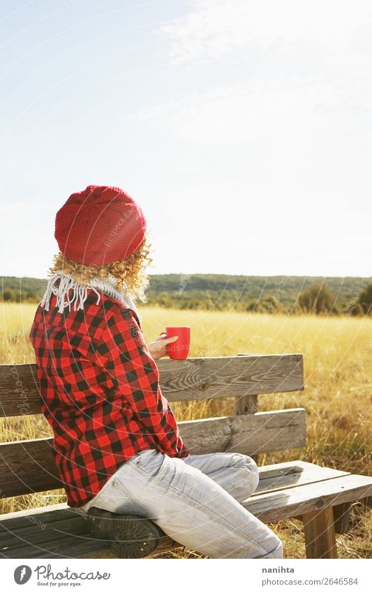 A young woman from behind in red plaid shirt Breakfast Drinking Hot drink Coffee Tea Lifestyle Healthy Wellness Relaxation Calm Vacation & Travel Freedom