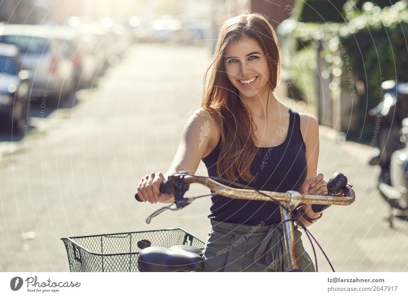 Attractive friendly young woman with her bicycle Lifestyle Joy Happy Beautiful Leisure and hobbies Summer Sports Woman Adults 1 Human being 18 - 30 years