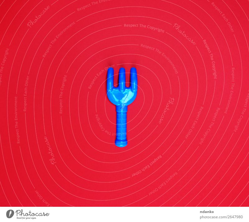 blue plastic baby rake on a red background Joy Playing Children's game Tool Toys Plastic Bright Above Blue Red Colour Spade Object photography one Single Comic