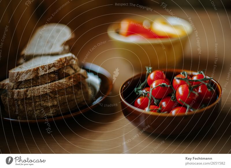 Plate with bread slices and bowl with cherry tomatoes Food Vegetable Bread Nutrition Lunch Dinner Organic produce Vegetarian diet Bowl Healthy Healthy Eating