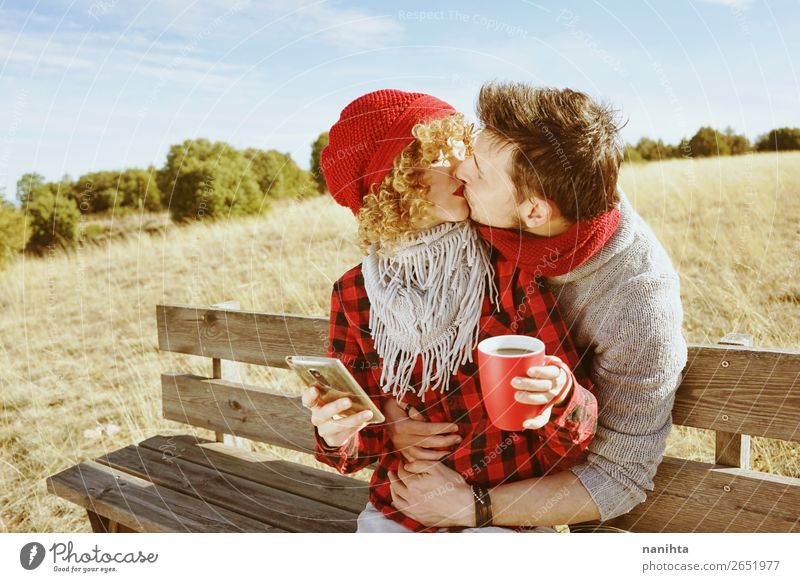 A young couple in love kiss Coffee Tea Lifestyle Happy Relaxation Calm Sunbathing PDA Human being Masculine Feminine Woman Adults Man Couple 2 18 - 30 years