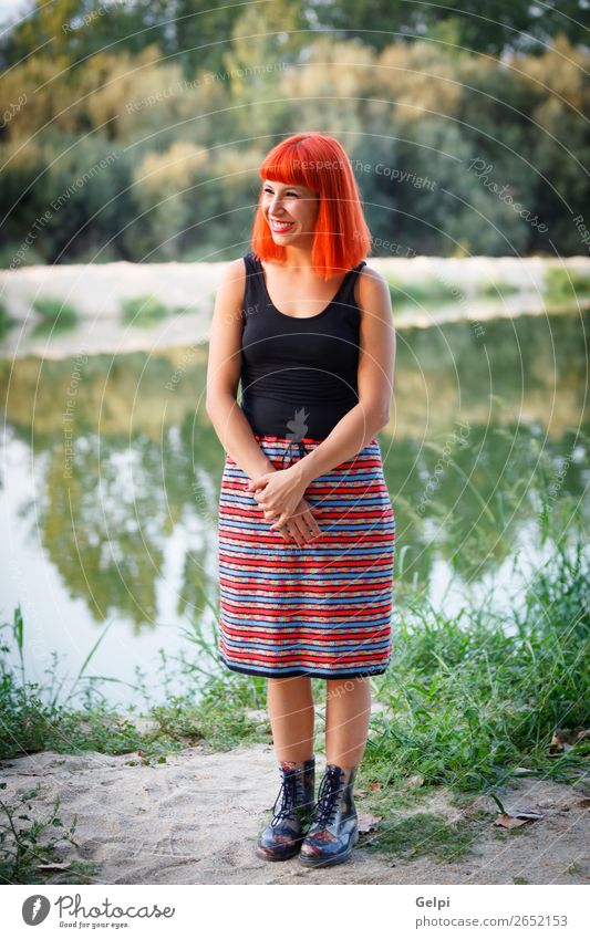 Beautiful redhead woman with a beautiful skirt relaxed Lifestyle Style Joy Happy Hair and hairstyles Face Wellness Calm Summer Human being Woman Adults Nature