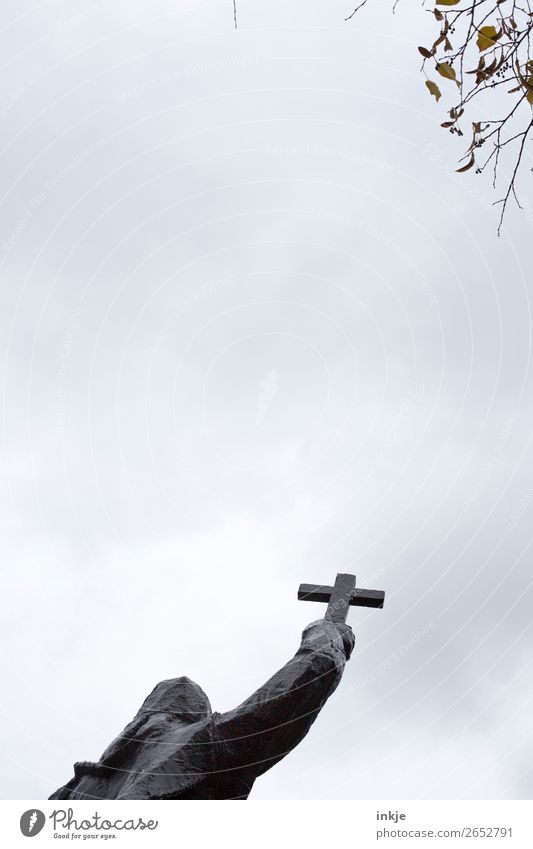 book cover Sky Autumn Winter Bad weather Branch Twig Statue Sculpture Crucifix Dark Belief Religion and faith Cold Haze Colour photo Subdued colour