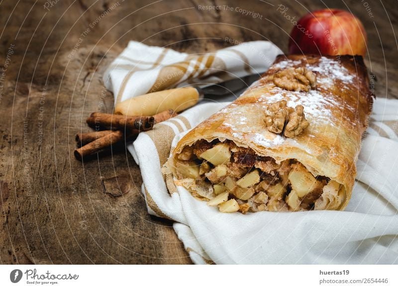 Homemade apple strudel with nuts Fruit Apple Dessert Candy Table Delicious food Sugar Home-made cake Baked goods stuffed Baking tasty kitchen Raisins roll