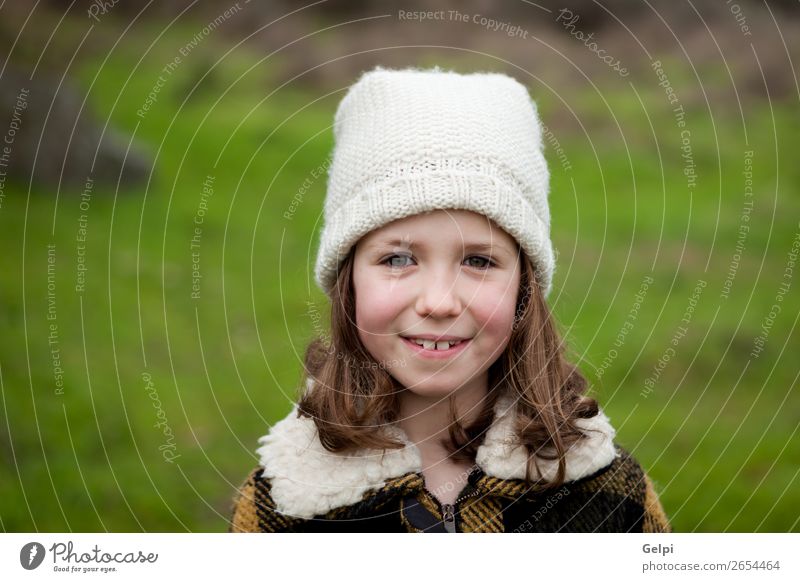 Pretty girl in a park at winter Joy Happy Beautiful Face Winter Garden Child Human being Toddler Woman Adults Family & Relations Infancy Nature Autumn Warmth