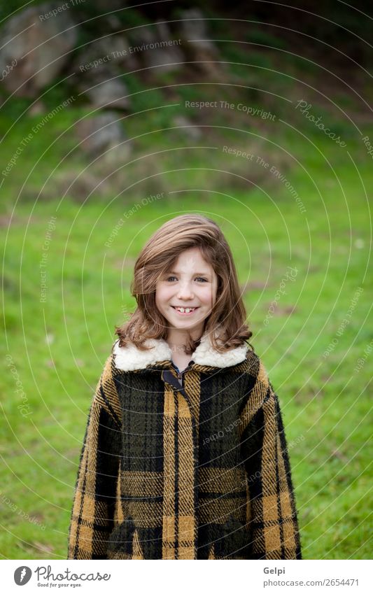 Beautiful girl with coat Joy Happy Face Winter Garden Child Human being Toddler Woman Adults Family & Relations Infancy Nature Autumn Warmth Grass Park Fashion