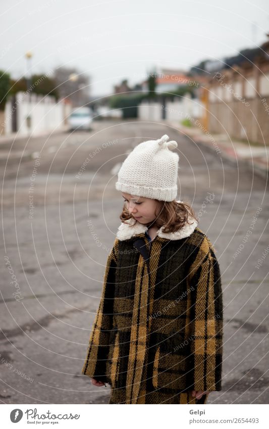 Beautiful girl with wool hat at winter Joy Happy Face Winter Child Human being Toddler Woman Adults Family & Relations Infancy Autumn Warmth Street Fashion Hat