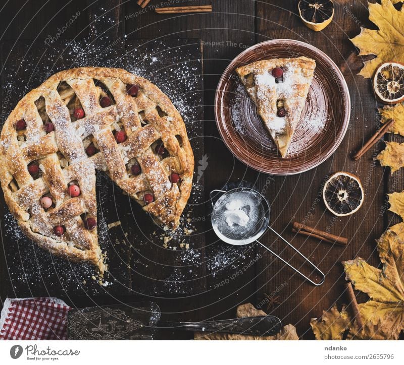 baked round apple pie and one cut piece on a plate Fruit Apple Cake Dessert Lunch Dinner Plate Table Kitchen Autumn Wood Eating Fresh Delicious Above Brown