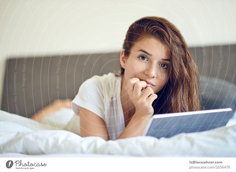 Brunette woman with tablet pc in bed Shopping Happy Beautiful Bedroom Business Computer Technology Internet Woman Adults 1 Human being Smiling Cute Comfortable