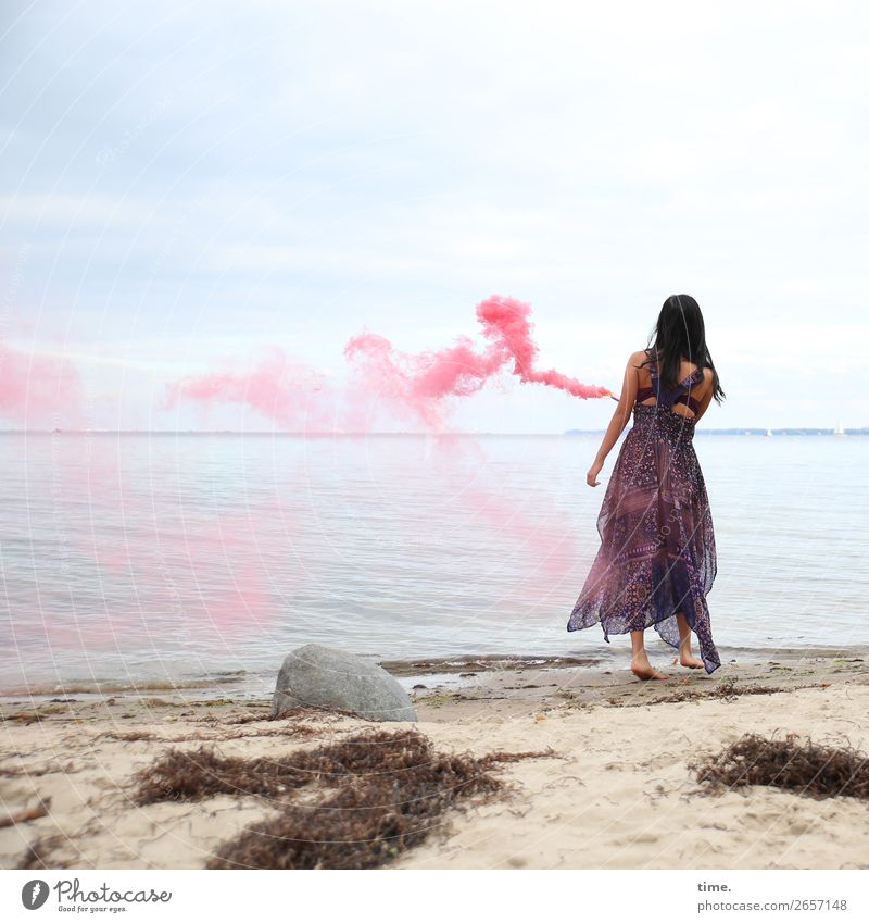 pink steam (III) Feminine Woman Adults 1 Human being Sand Sky Horizon Seaweed Coast Beach Baltic Sea Dress Black-haired Long-haired Torch Smoke Stone Movement