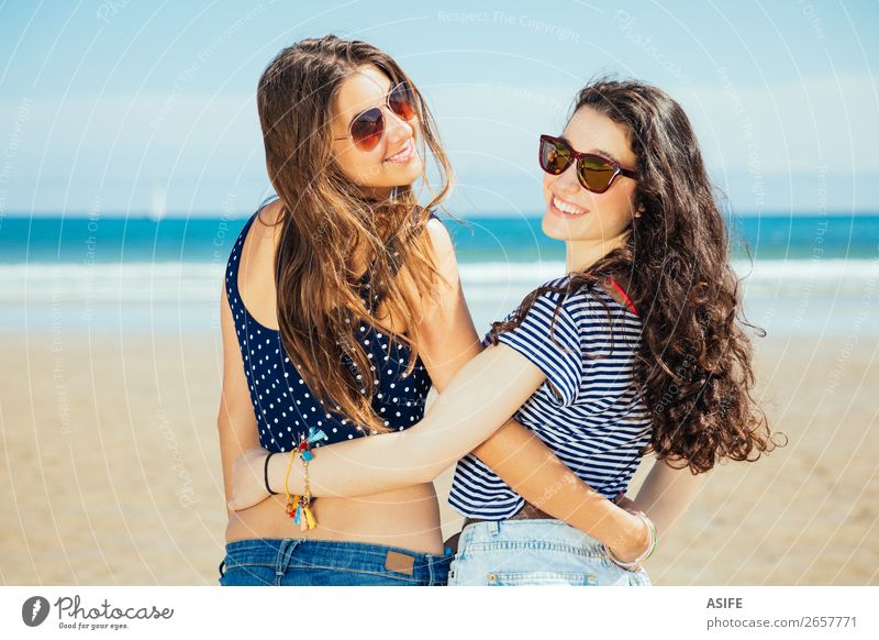 Best friends on the beach Joy Happy Vacation & Travel Tourism Summer Beach Ocean Woman Adults Friendship Youth (Young adults) Nature Sand Sky Bikini Sunglasses