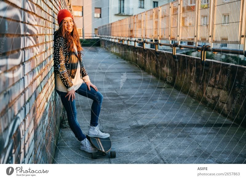 Skater woman at sunset enjoying the sun Lifestyle Style Joy Happy Beautiful Leisure and hobbies Winter Sports Woman Adults Youth (Young adults) Culture Autumn