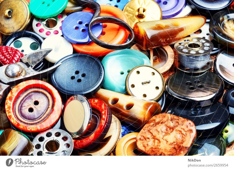 Background of sewing buttons fashion clothing tailor design circle background mix texture collection plastic colorful needlework closeup group many retro