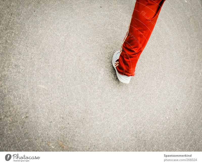 running miracles Fitness Sports Training Sportsperson Jogging Legs Movement Going Walking Healthy Red Street Colour photo Exterior shot Copy Space left