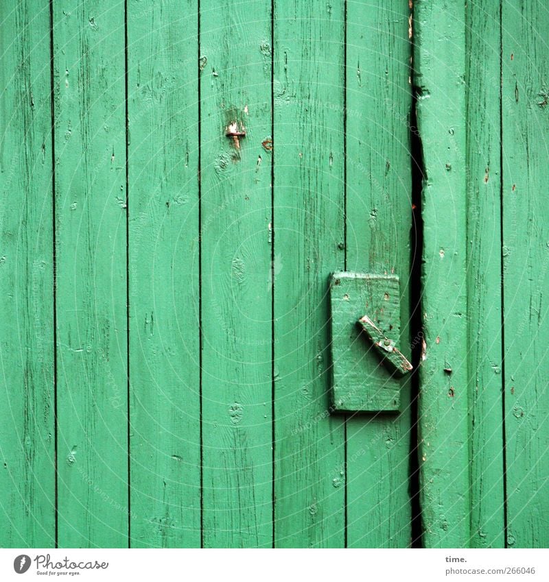 crafted Locking mechanism Closure Hut Door Wood Dirty Simple Green Uniqueness Precision Calm Moody Decline Change Farm Agriculture Barn Colour photo
