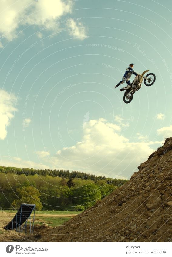 Flying Mike Sports Motorsports Engines Human being Emotions Motorcyclist Motocross driver Jump Stuntman Colour photo Exterior shot 1 Motorcycle Ramp Dangerous