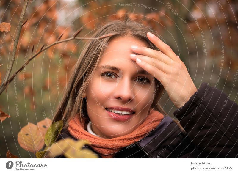 pretty woman with hand on forehead, autumn leaves Woman Adults Face Hand 1 Human being Autumn Plant Leaf Park Forest Touch Movement Happiness Happy Beautiful