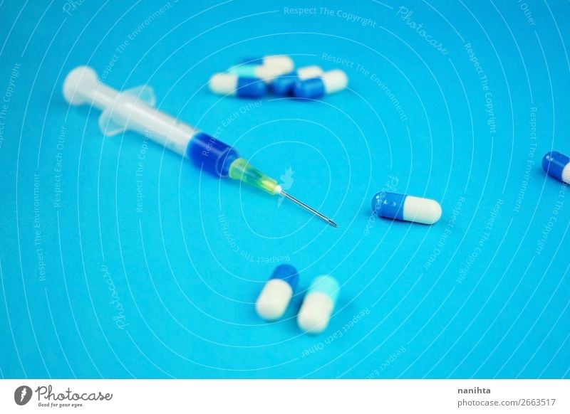 A detailed macro of a syringe by pills with needle Design Healthy Health care Medical treatment Illness Intoxicant Medication Sharp-edged Simple Small Clean