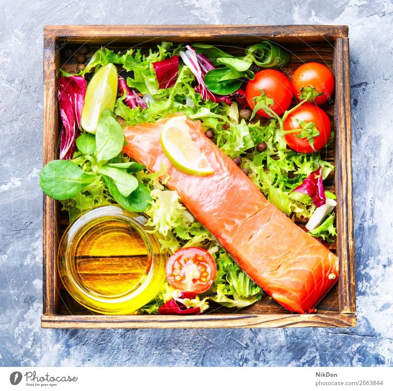 Salted salmon fillet with aromatic herbs seafood fish box dinner natural salt diet slice tomato trout lettuce piece lemon salted green meat dieting salty