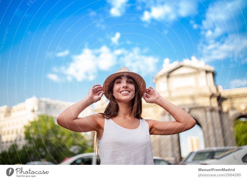 young tourist woman at puerta alcala madrid Lifestyle Happy Beautiful Vacation & Travel Tourism Summer Human being Woman Adults Street Fashion Hat Smiling Joy