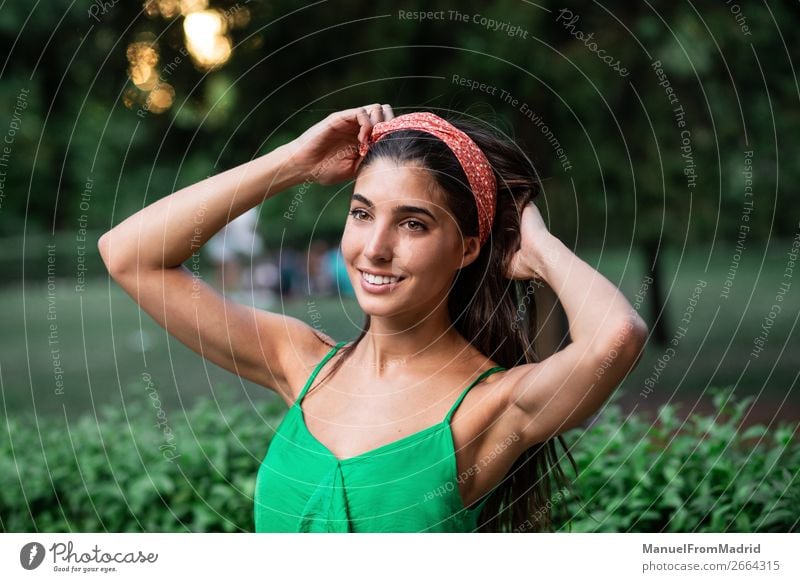 Portrait of a young happy woman in the park Lifestyle Happy Beautiful Vacation & Travel Tourism Summer Human being Woman Adults Nature Park Street Fashion
