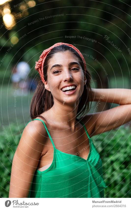 Portrait of a young happy woman in the park Lifestyle Happy Beautiful Vacation & Travel Tourism Summer Human being Woman Adults Nature Park Street Fashion