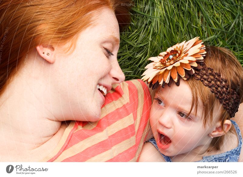 Smiling Mother And Daughter Laying In Tall Grass Joy Happy Child Toddler Girl Adults Red-haired Green parenthood motherhood mommy's girl red hair laying kid