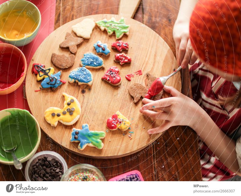 from the bakery Child 1 Human being Fragrance Baking Christmas & Advent Cookie Multicoloured Hand Christmas biscuit Delicious Colour photo Interior shot