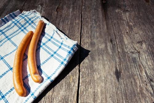 dream couple Food Sausage Nutrition Lunch Picnic Table Wood Lie Simple Delicious Natural Brown Small sausage Wooden table Dish towel In pairs Crunchy Bavarian