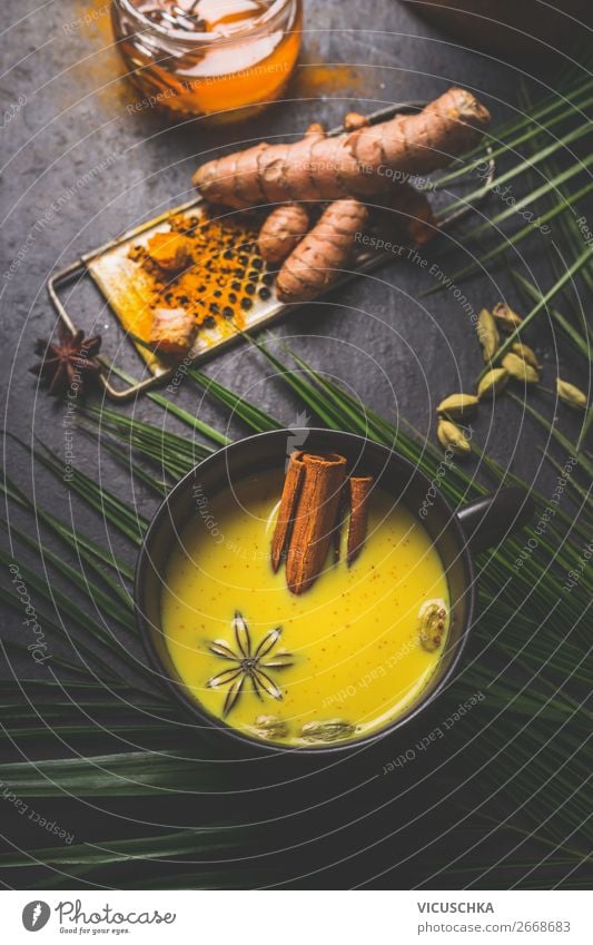 Cup with golden turmeric milk and spices Food Herbs and spices Nutrition Organic produce Vegetarian diet Diet Beverage Hot drink Milk Tea Design Healthy