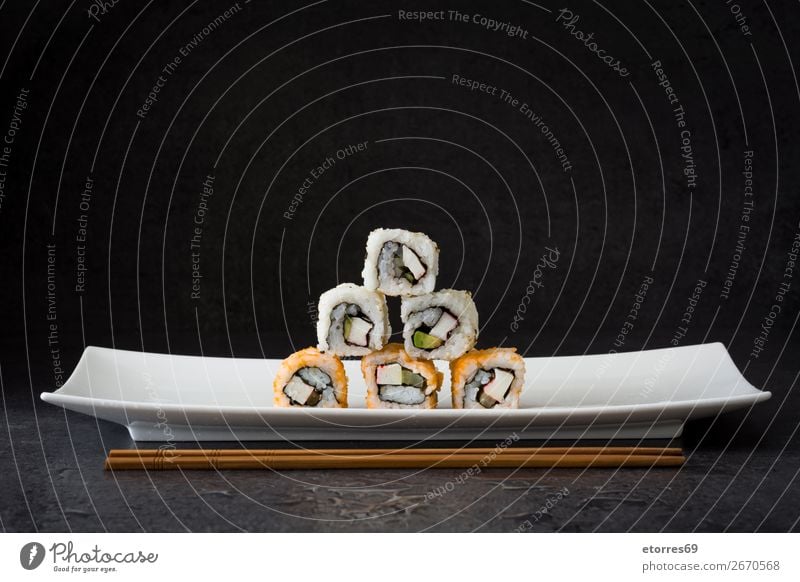 sushi assortment in white plate on black background Sushi Food Healthy Eating Food photograph Japanese Rice Fish Salmon Seafood Roll Meal Plate maki Gourmet