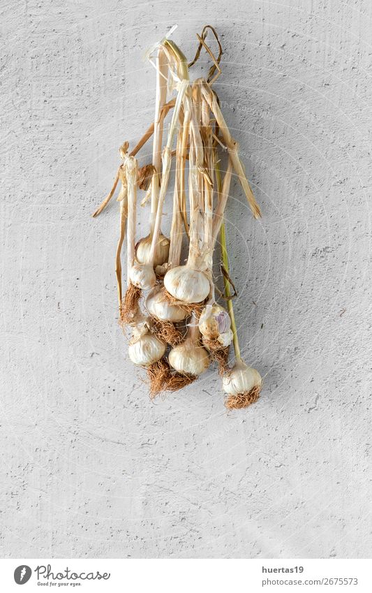 Bouquet of fresh purple garlic Vegetable Herbs and spices Art Fresh Natural Above White Garlic food background flat lay bulb Agriculture healthy seasoning