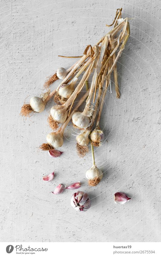Bouquet of fresh purple garlic Food Vegetable Herbs and spices Nutrition Art Fresh Delicious Natural Above White Garlic background flat lay bulb Agriculture