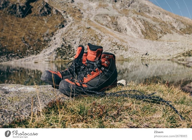 Hiking boots in front of mountain panorama Mountain Climbing Mountaineering Nature Landscape Summer Beautiful weather Meadow Rock Alps Peak Mountain lake Boots