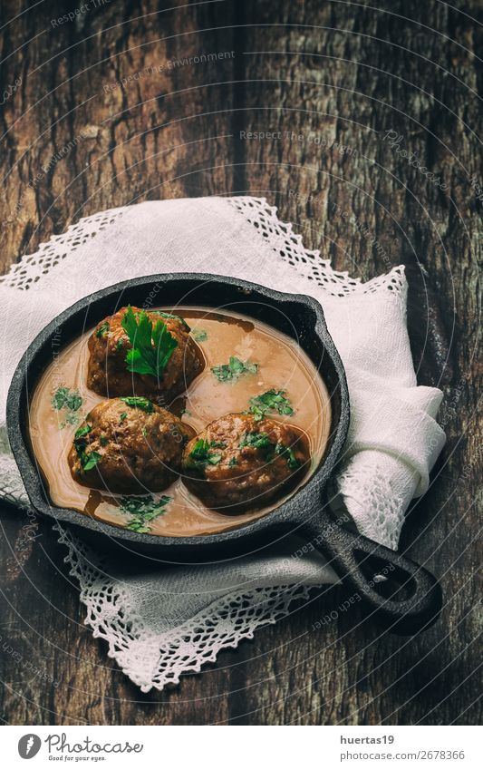 Homemade Albondigas with Spanish sauce Food Meat Sausage Herbs and spices Lunch Dinner Buffet Brunch Italian Food Fork Art Delicious Above Red Tradition