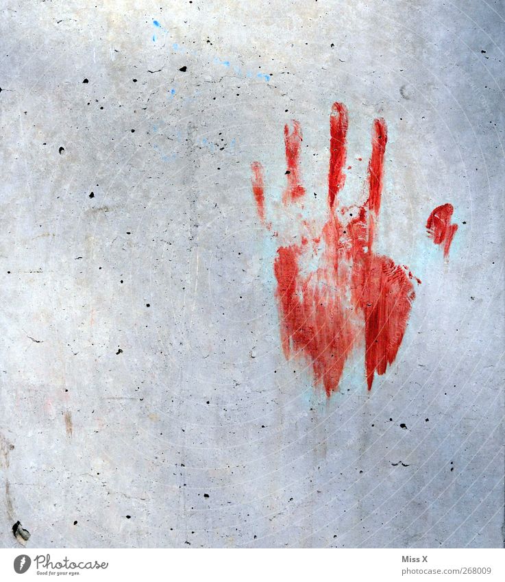 the dear neighbour is back Hand Fingers Wall (barrier) Wall (building) Dirty Red Fear Horror Fear of death Dangerous Imprint Murder Criminality Colour photo