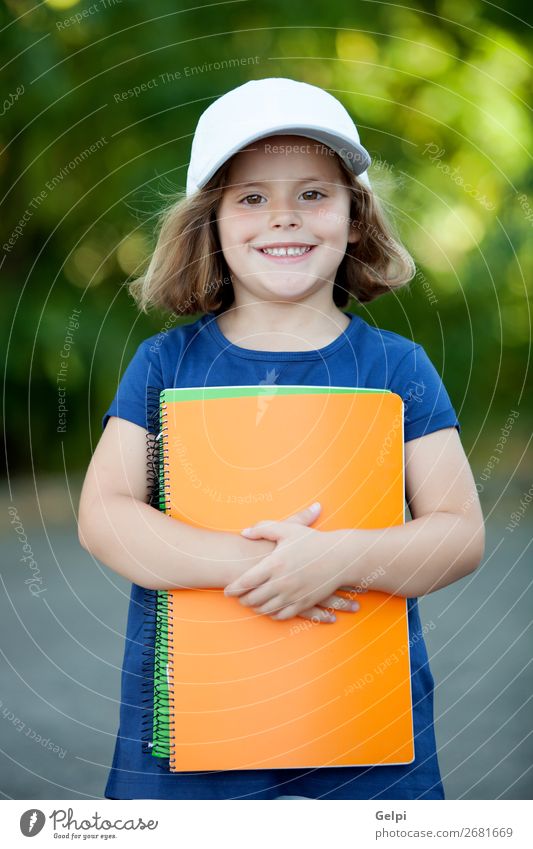 Cute little girl with a cap Joy Happy Beautiful Life Leisure and hobbies Vacation & Travel Camping Summer Child Human being Toddler Woman Adults Infancy Book