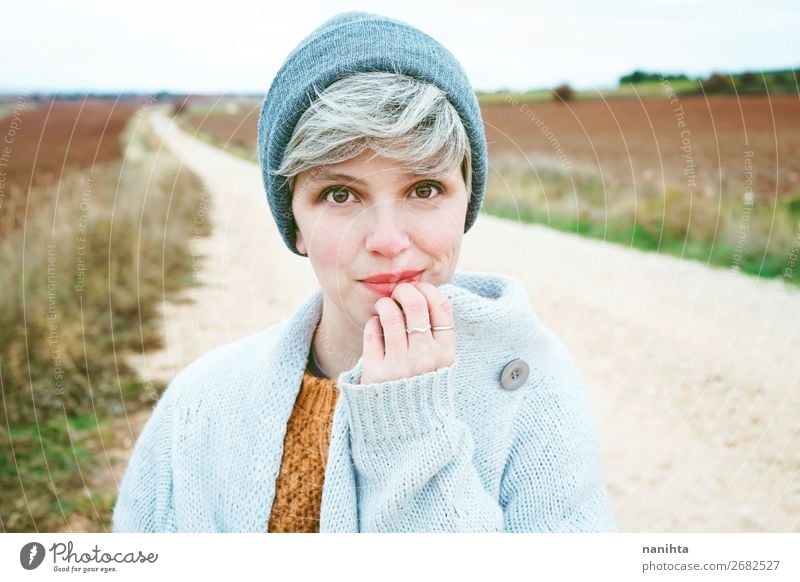 Woman with short and gray hair alone in a path Lifestyle Style Hair and hairstyles Skin Face Wellness Well-being Adventure Far-off places Winter Human being