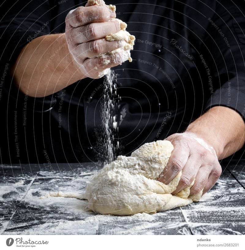 men's hands knead white wheat flour yeast dough Dough Baked goods Bread Table Kitchen Cook Woman Adults Man Hand 30 - 45 years Wood Make Fresh White Flour