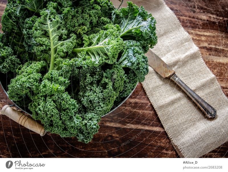 Fresh kale leaves Food Vegetable Lettuce Salad Cabbage Kale Kale leaf Bowl Knives Lifestyle Healthy Eating Wood Old Authentic Delicious Natural Brown Green