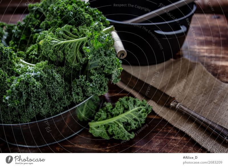 Prepare fresh kale for cooking Food Vegetable Lettuce Salad Kale Kale leaf Cabbage Organic produce Vegetarian diet Diet Fasting Bowl Pot Knives Lifestyle