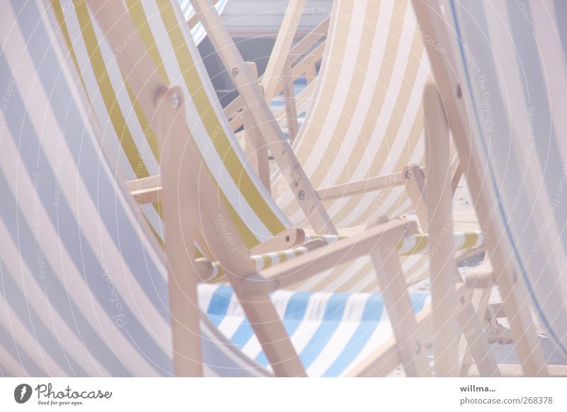 Empty deck chairs in the sun Beach Deckchair Relaxation Bright Leisure and hobbies Boredom Striped Pastel tone Warmth Deserted deckchairs Lifestyle