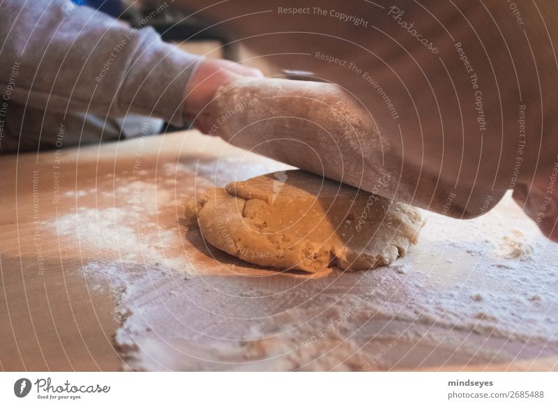 roll out the dough Food Dough Baked goods cookie dough Rolling pin Chopping board Baking Kitchen Christmas & Advent Child Arm 1 Human being 3 - 8 years Infancy